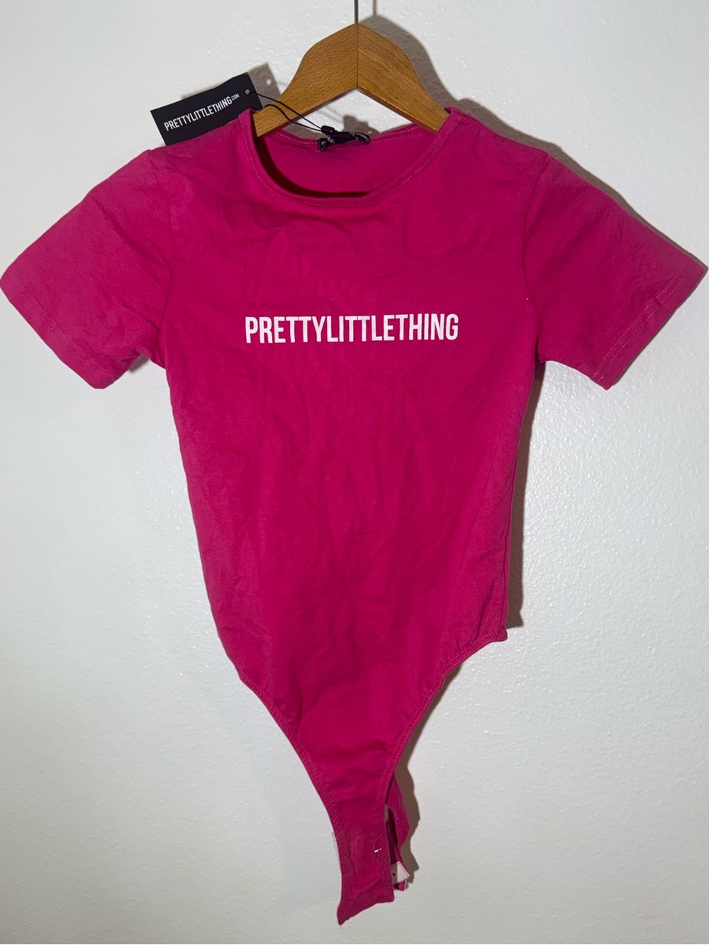 NWT PRETTYLITTLETHING Womens Hot Pink Logo One-Piece Bodysuit